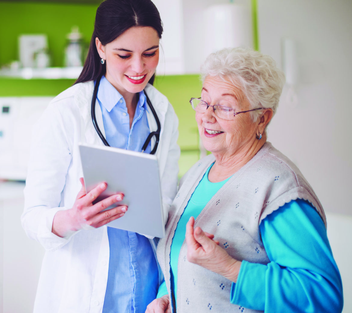 Older woman consulting with her physician