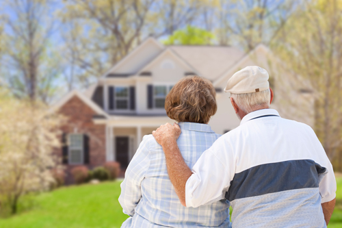 Older couple contemplating selling their home and downsizing