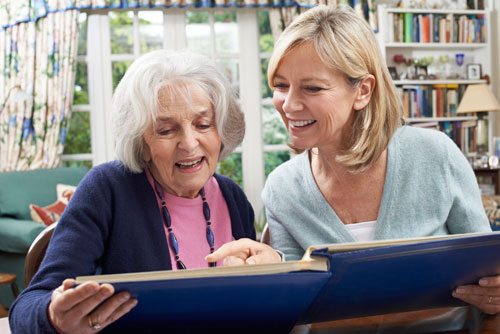 Woman and caregiver in Memory Care