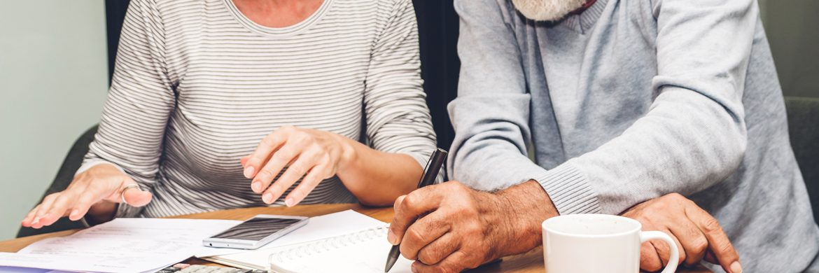 Older couple planning for the costs of aging.