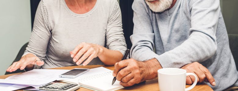 Older couple planning for the costs of aging.