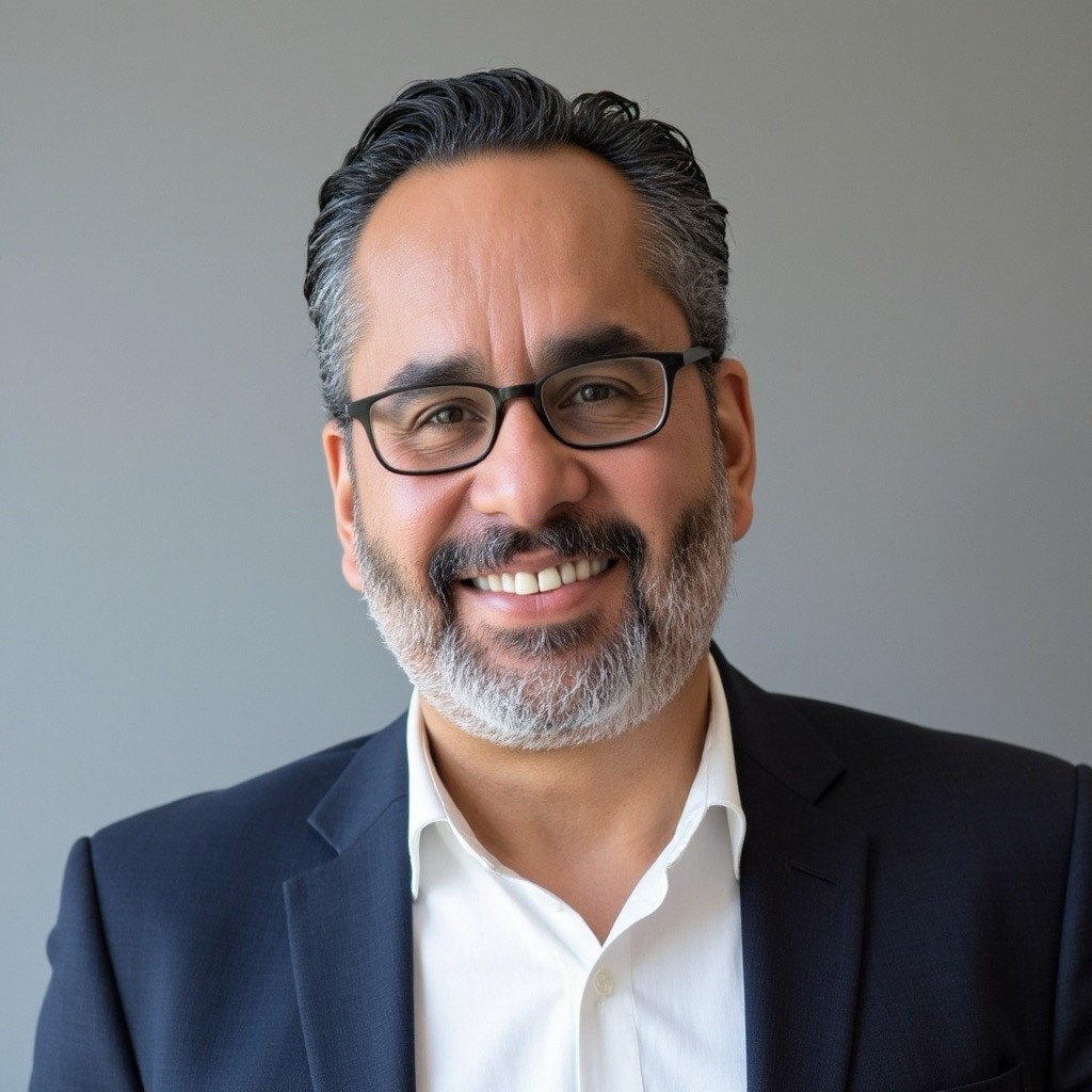 Fred Arzola, Ph.D., Chaplain and Spiritual Care Coordinator.