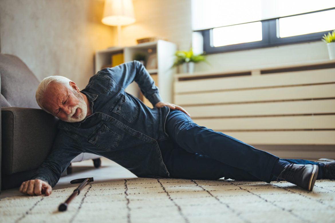 An older man has fallen in his home.