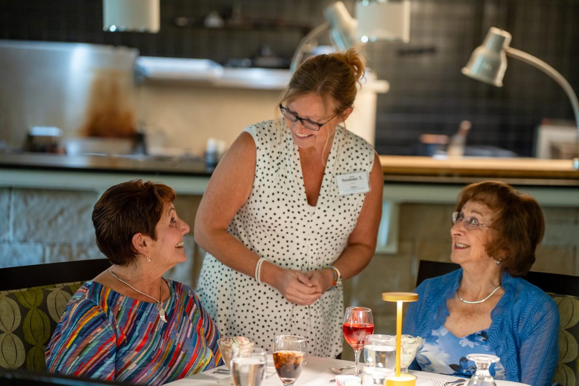 Two women place their orders while dining at Friendship Village of Dublin.