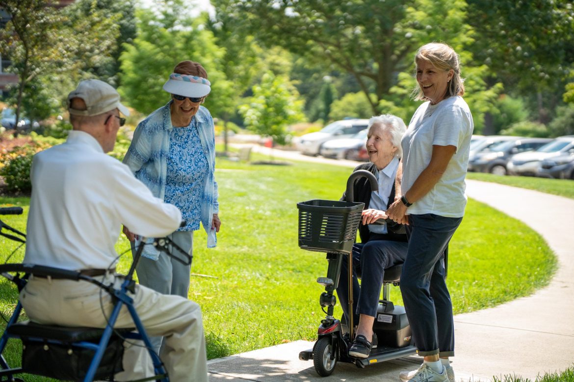 Residents gather on the walking trail at Friendship Village of Dublin.