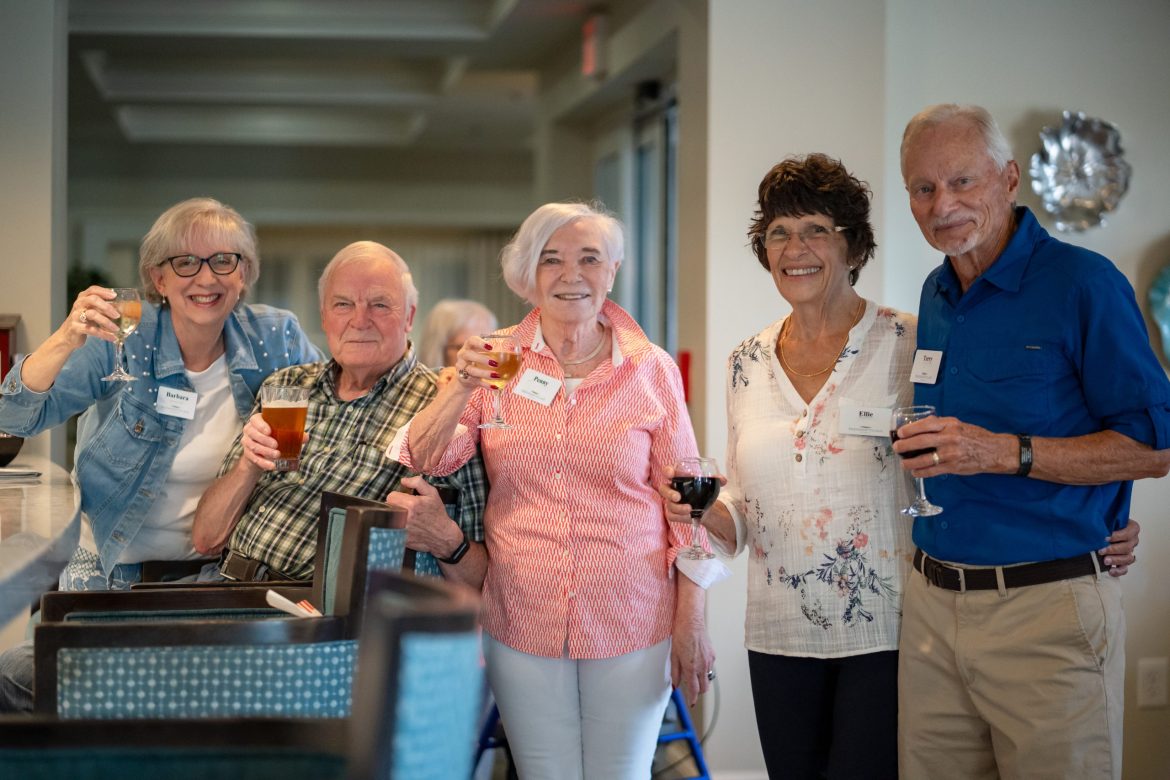 Group of Residents raising glasses in a toast